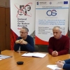 Professor Mariusz Dąbrowski (left) is signing the agreement (photo NCBJ)